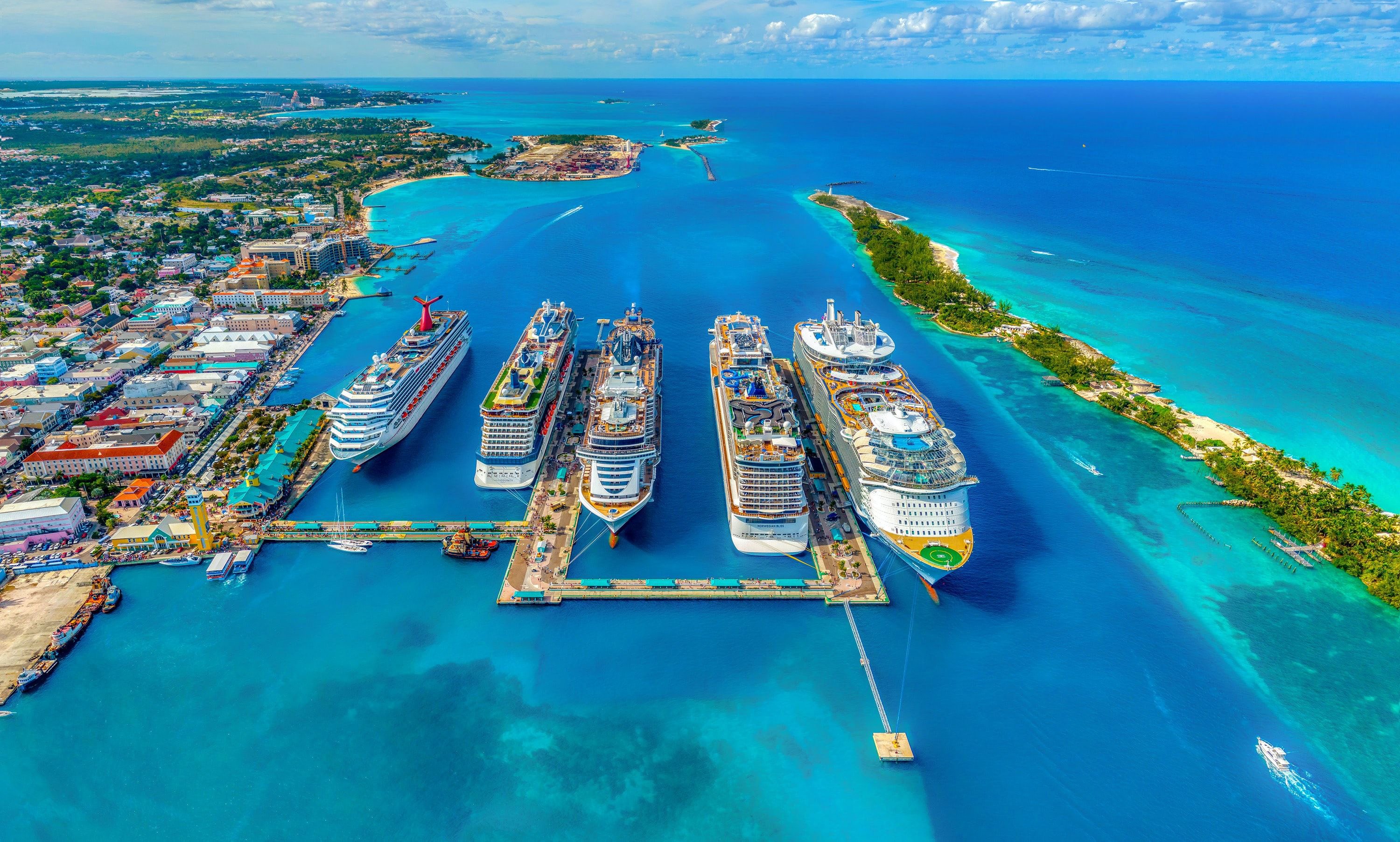 Multiple Ships Docked Blue Water and Sky